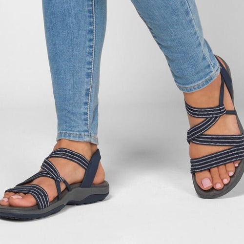 Damen-Flachsandalen mit gekreuzten Elastikriemen